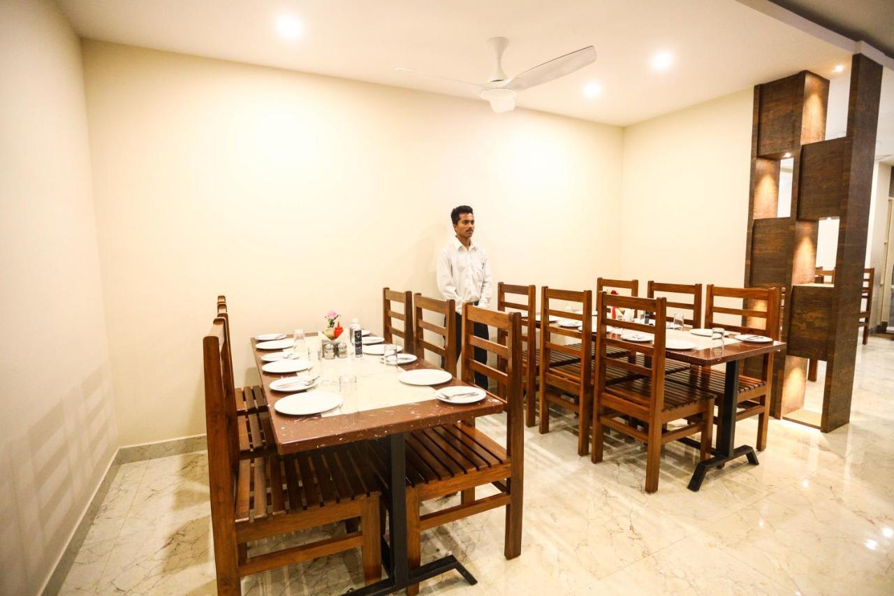 Cliff Embassy Banquet And Suites Shimoga Exterior foto